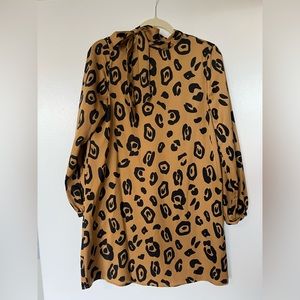 Cheetah print shift dress with high neck bow tie